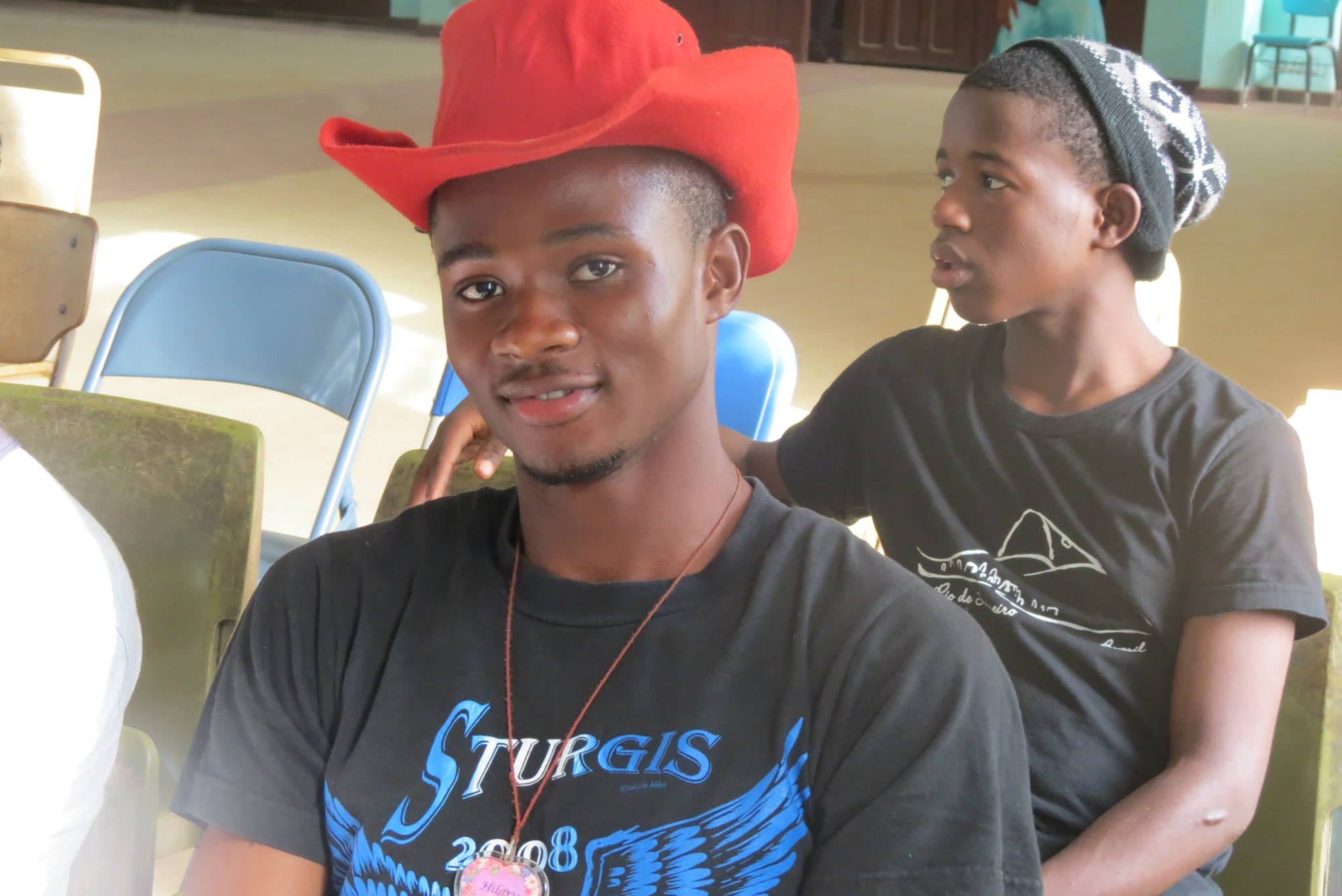 me wearing a red cowboy hat